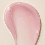 Axis-Y Calamine Pore Control apsule Serum texture reference. The serum is of a light pink gel consistency with tiny capsules in it.